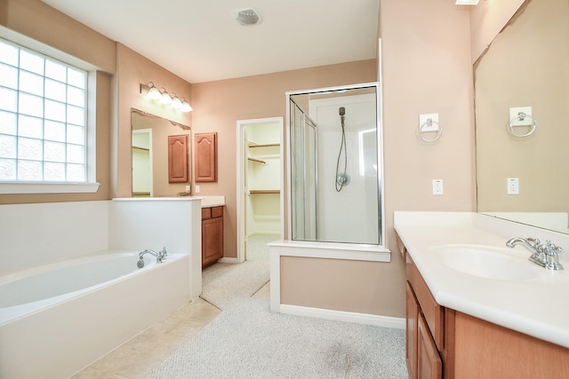 5823 Lundwood Ln, Houston, TX 77084 - full bath with a shower stall, vanity, a garden tub, and a spacious closet