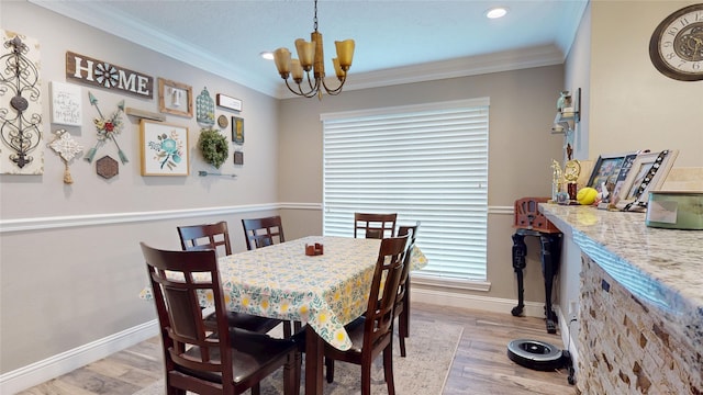 2010 Wildwood Dr, Deer Park, TX 77536 - dining room featuring a chandelier, light wood-style flooring, ornamental molding, and recessed lighting