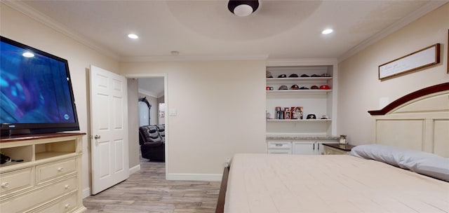 2010 Wildwood Dr, Deer Park, TX 77536 - bedroom featuring light wood-type flooring, crown molding, and recessed lighting