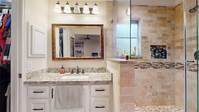 2010 Wildwood Dr, Deer Park, TX 77536 - full bath with a tile shower, vanity, and a spacious closet