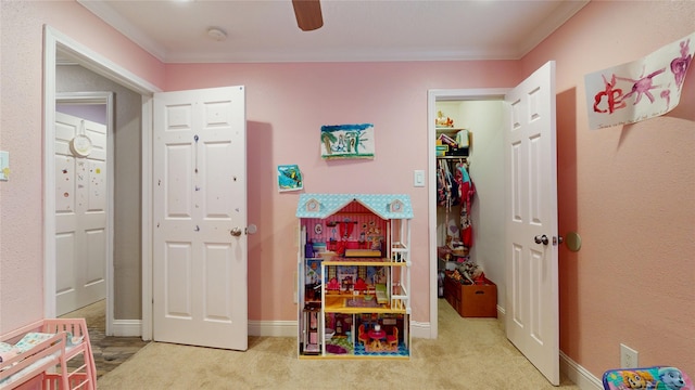 2010 Wildwood Dr, Deer Park, TX 77536 - playroom featuring crown molding, carpet floors, and a ceiling fan
