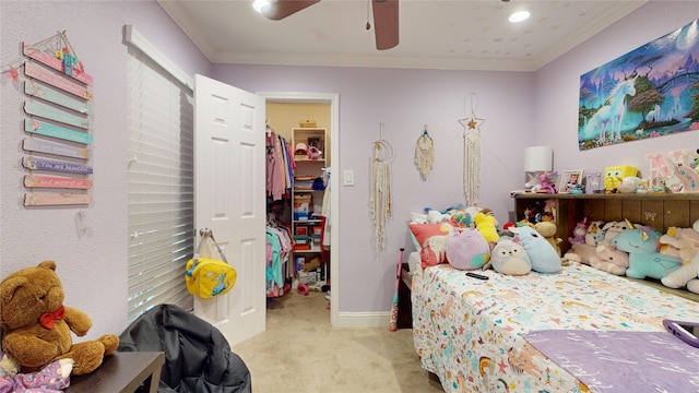 2010 Wildwood Dr, Deer Park, TX 77536 - carpeted bedroom with a spacious closet, ornamental molding, a closet, and ceiling fan