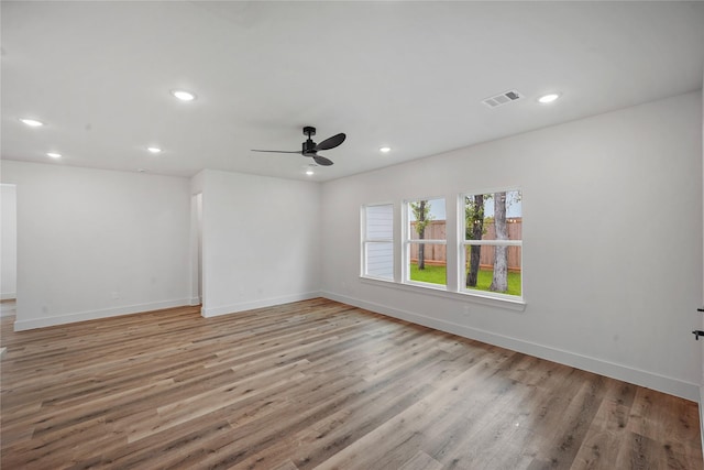19219 Hikers Trail Dr, Humble, TX 77346 - empty room with recessed lighting, light wood-style floors, and a ceiling fan