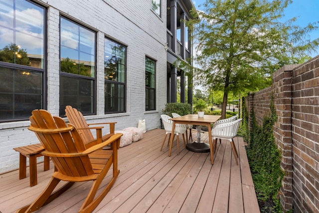 152 E Shell Port Sq, The Woodlands, TX 77380 - wooden terrace with outdoor dining space