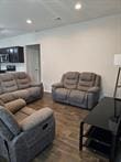 2407 Hartsel Forest Trl, Spring, TX 77373 - living room featuring recessed lighting