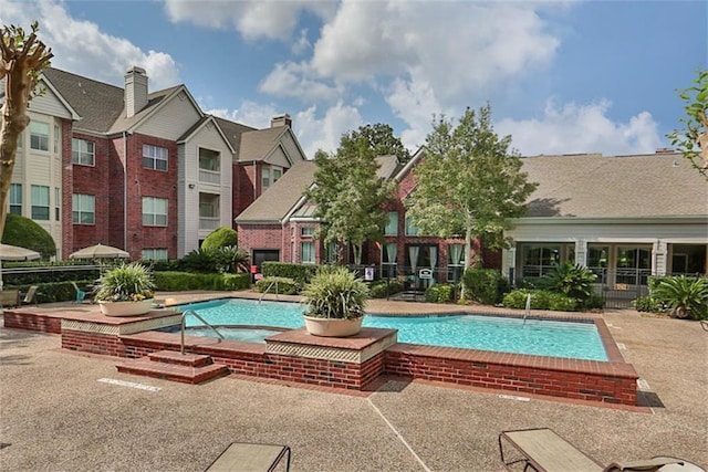 1330 Old Spanish Trl Unit 3201, Houston, TX 77054 - community pool featuring a patio
