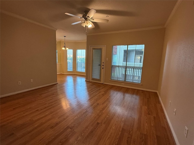 1330 Old Spanish Trl Unit 3201, Houston, TX 77054 - unfurnished room featuring wood finished floors, ceiling fan, crown molding, and a chandelier