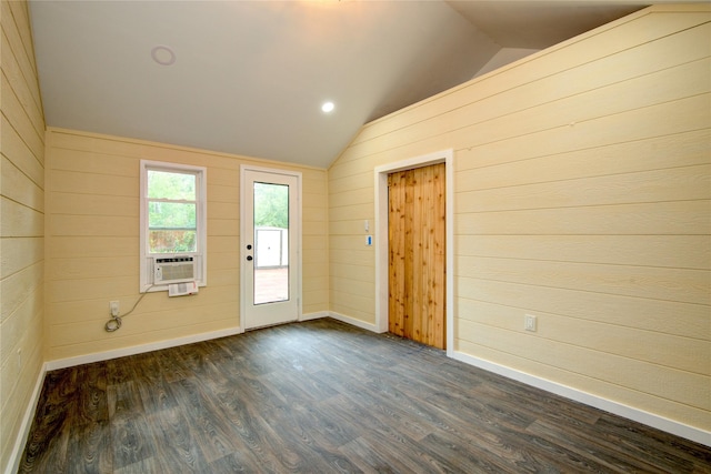 13903 Chevy Chase Dr, Houston, TX 77077 - spare room with lofted ceiling, cooling unit, dark wood-type flooring, wood walls, and recessed lighting