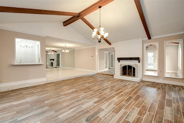 13903 Chevy Chase Dr, Houston, TX 77077 - unfurnished living room with a chandelier, a fireplace, and wood finished floors