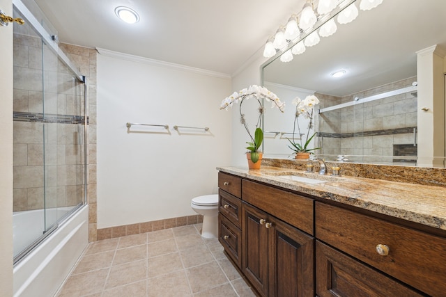 5001 Woodway Dr Unit 1701, Houston, TX 77056 - full bath featuring ornamental molding, tile patterned flooring, vanity, and combined bath / shower with glass door