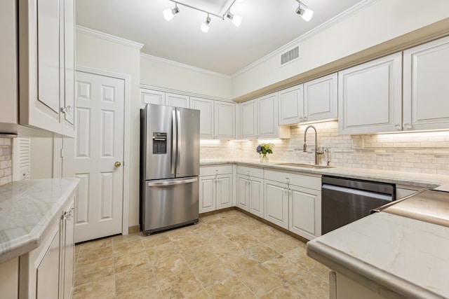 5001 Woodway Dr Unit 1701, Houston, TX 77056 - kitchen featuring stainless steel appliances, decorative backsplash, white cabinetry, and crown molding