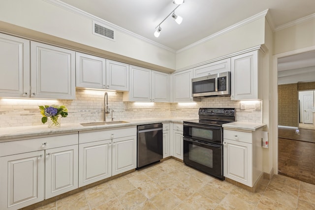 5001 Woodway Dr Unit 1701, Houston, TX 77056 - kitchen featuring appliances with stainless steel finishes, white cabinetry, decorative backsplash, and crown molding