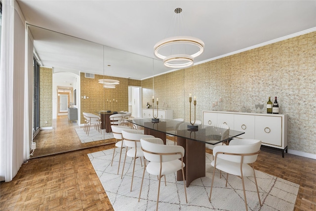5001 Woodway Dr Unit 1701, Houston, TX 77056 - dining area with baseboards and crown molding