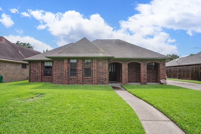3701 Regency Dr, Deer Park, TX 77536 - view of front of home with roof with shingles and brick siding