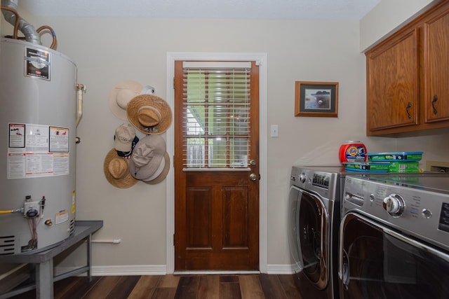 3701 Regency Dr, Deer Park, TX 77536 - laundry room featuring water heater, dark wood-type flooring, independent washer and dryer, and cabinet space