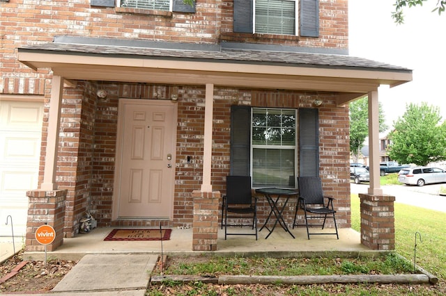 3619 Robwood Ct, Katy, TX 77449 - view of exterior entry featuring a porch and brick siding