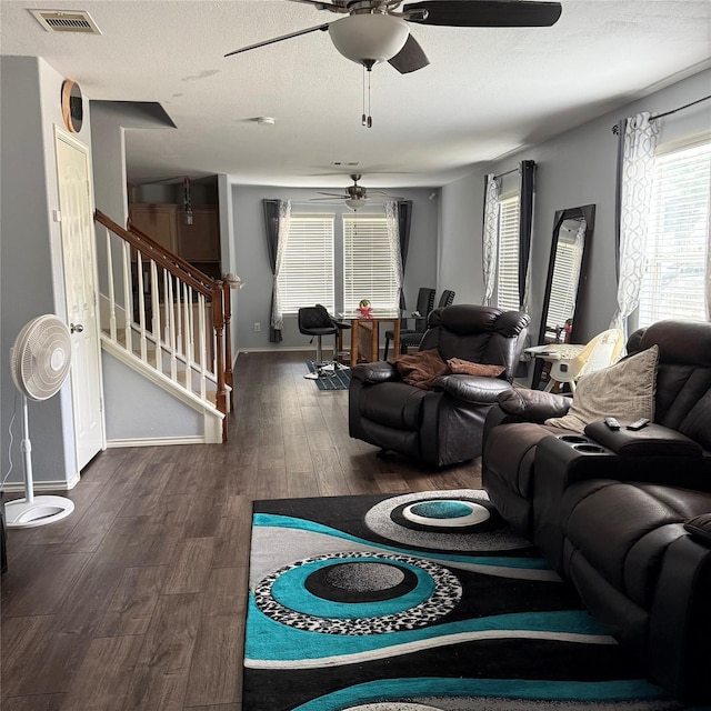 3619 Robwood Ct, Katy, TX 77449 - living room with a ceiling fan, wood finished floors, stairway, and a textured ceiling