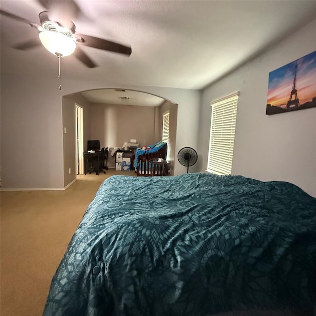 3619 Robwood Ct, Katy, TX 77449 - bedroom with arched walkways and carpet floors
