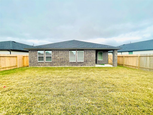 4107 Yosemite Valley Ct, Katy, TX 77494 - back of property with brick siding, a fenced backyard, and a shingled roof
