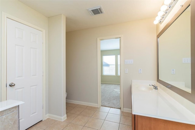 15807 Sarasam Creek Ct, Cypress, TX 77429 - bathroom featuring vanity and tile patterned floors
