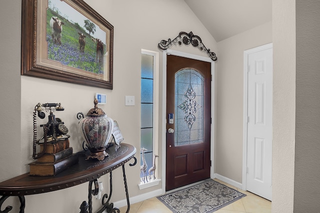 9827 Kimberly Loch Ln, Houston, TX 77089 - foyer with lofted ceiling and light tile patterned floors