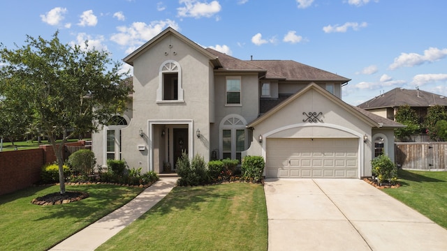 6510 Brady Springs Ct, Sugar Land, TX 77479 - view of front facade featuring stucco siding, driveway, and an attached garage