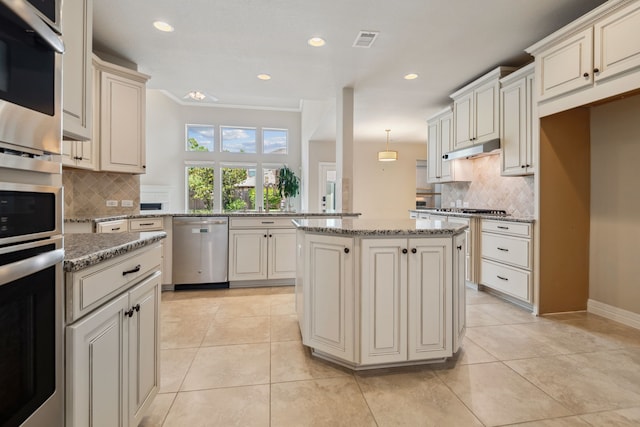 6510 Brady Springs Ct, Sugar Land, TX 77479 - kitchen with dishwasher, decorative backsplash, light stone countertops, light tile patterned flooring, and recessed lighting