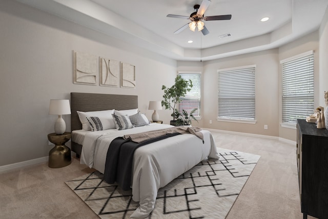 6510 Brady Springs Ct, Sugar Land, TX 77479 - bedroom featuring light colored carpet, a raised ceiling, recessed lighting, and ceiling fan