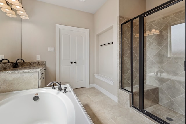 6510 Brady Springs Ct, Sugar Land, TX 77479 - full bathroom featuring a shower stall, vanity, a bath, a chandelier, and tile patterned flooring