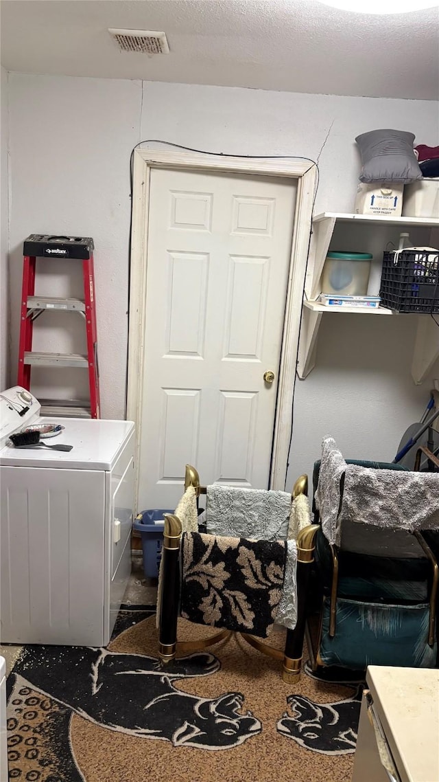 5510 Chennault Rd, Houston, TX 77033 - bedroom featuring washing machine and clothes dryer