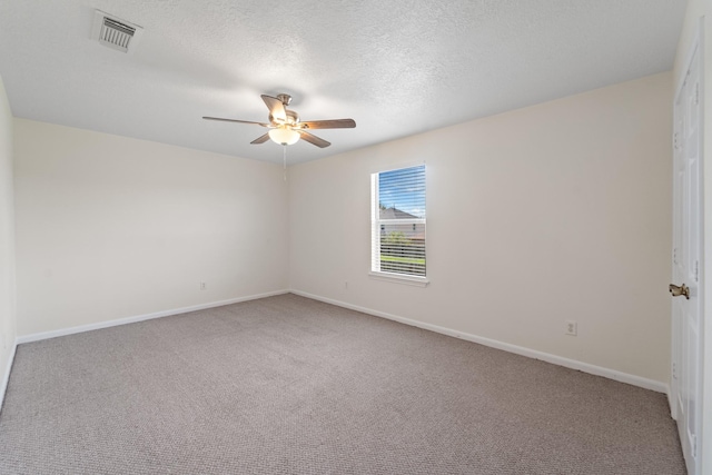 1022 Vera Cruz Dr, Rosenberg, TX 77471 - unfurnished room with carpet flooring, a ceiling fan, and a textured ceiling