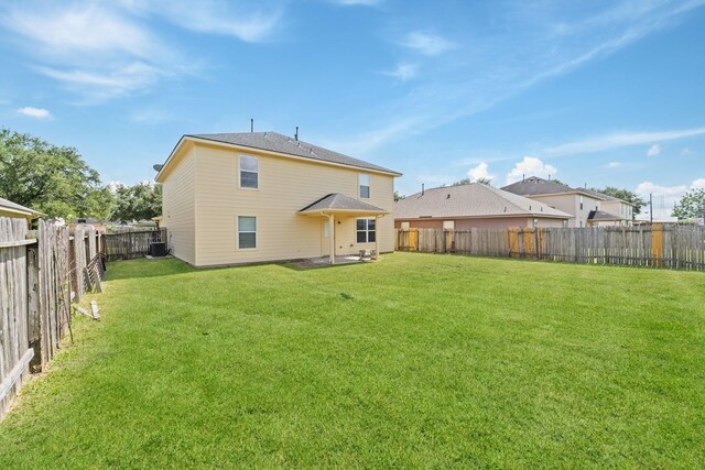 1022 Vera Cruz Dr, Rosenberg, TX 77471 - back of property with a fenced backyard