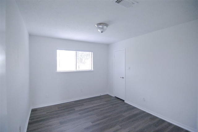 6503 Gladewell Dr, Houston, TX 77072 - empty room featuring dark wood-type flooring