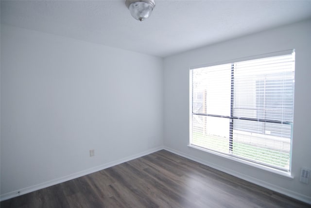 6503 Gladewell Dr, Houston, TX 77072 - unfurnished room with dark wood-style floors and plenty of natural light