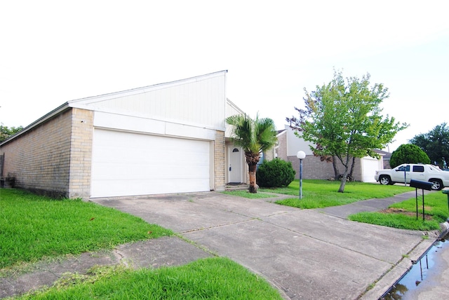 6503 Gladewell Dr, Houston, TX 77072 - view of front of house with brick siding, a front lawn, driveway, and an attached garage