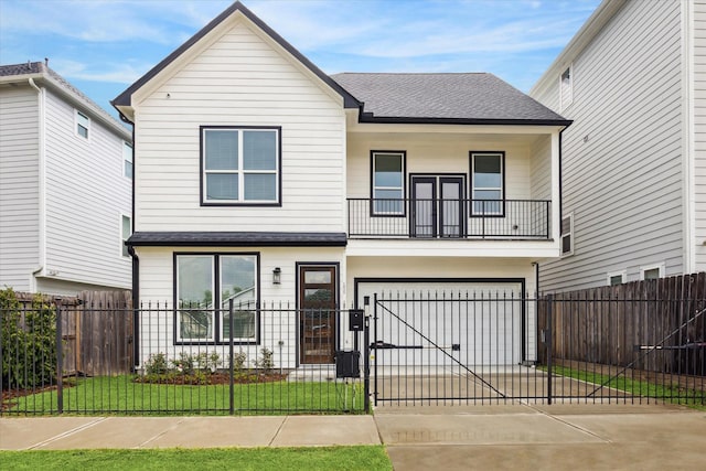 1825 Northwood Dr, Houston, TX 77009 - view of front facade featuring a balcony, driveway, roof with shingles, a fenced front yard, and a garage
