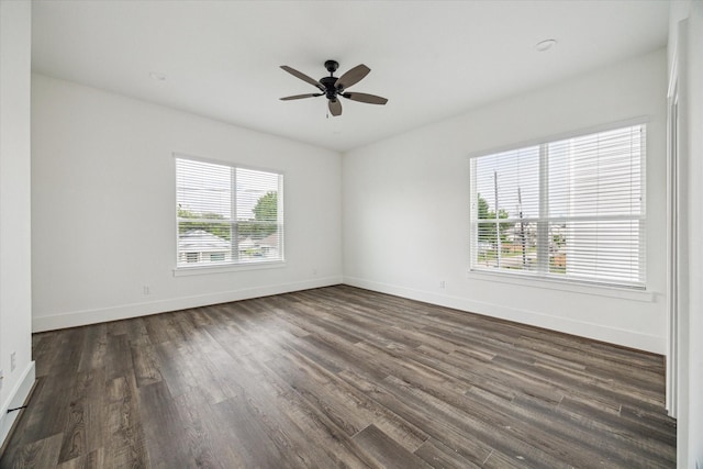 1825 Northwood Dr, Houston, TX 77009 - empty room with dark wood-type flooring and ceiling fan