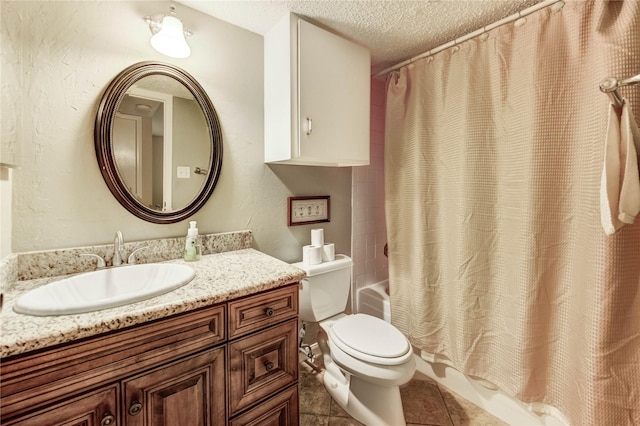 12550 Whittington Dr Unit 816, Houston, TX 77077 - full bathroom with shower / bath combo with shower curtain, vanity, tile patterned floors, and a textured ceiling