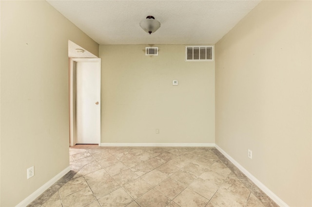12550 Whittington Dr Unit 816, Houston, TX 77077 - unfurnished room with a textured ceiling and baseboards