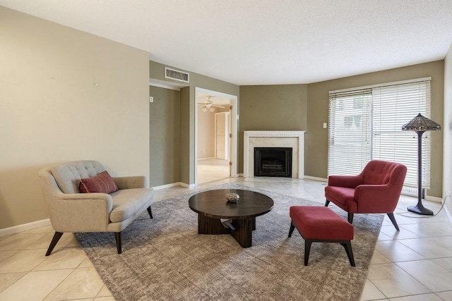 12550 Whittington Dr Unit 816, Houston, TX 77077 - living room with light tile patterned floors and a fireplace