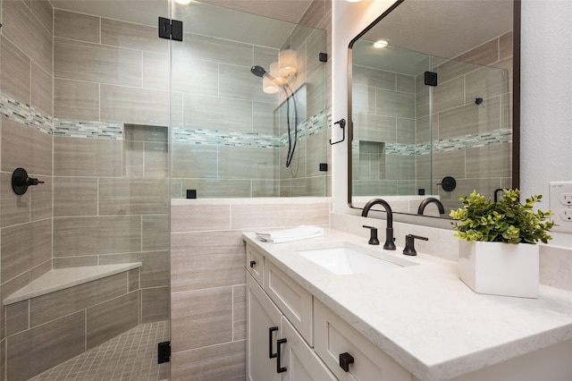 8932 Padfield St, Houston, TX 77055 - bathroom featuring vanity and a stall shower