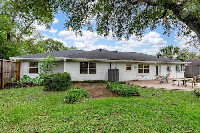 8932 Padfield St, Houston, TX 77055 - rear view of house with a patio area and brick siding