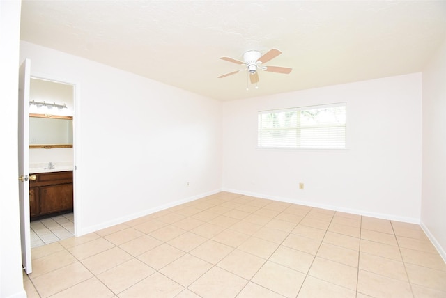 12006 Scottsdale Dr, Meadows Place, TX 77477 - unfurnished room with a ceiling fan and light tile patterned floors