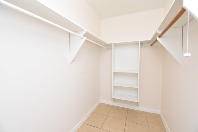 12006 Scottsdale Dr, Meadows Place, TX 77477 - walk in closet with tile patterned floors