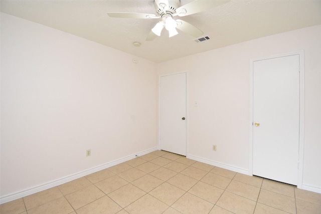 12006 Scottsdale Dr, Meadows Place, TX 77477 - unfurnished room featuring ceiling fan, light tile patterned floors, and a smoke detector