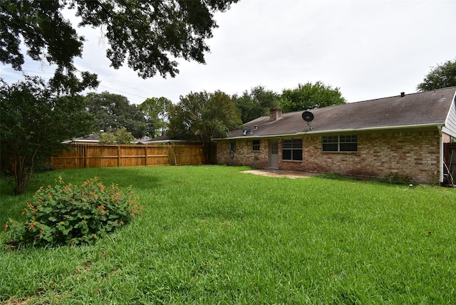 12006 Scottsdale Dr, Meadows Place, TX 77477 - view of yard featuring a patio area