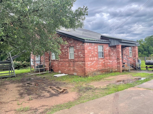 20661 Cochran Rd, Prairie View, TX 77445 - view of property exterior with brick siding and crawl space