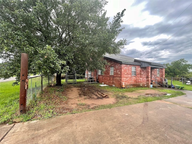 20661 Cochran Rd, Prairie View, TX 77445 - view of property exterior with brick siding