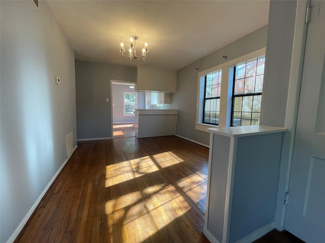 1805 Sul Ross St, Houston, TX 77098 - unfurnished dining area featuring plenty of natural light, dark wood-style flooring, and a chandelier