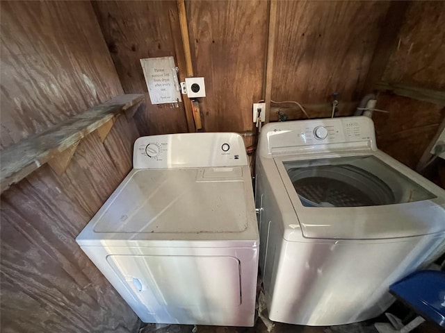1805 Sul Ross St, Houston, TX 77098 - laundry room with washer and dryer and wooden walls